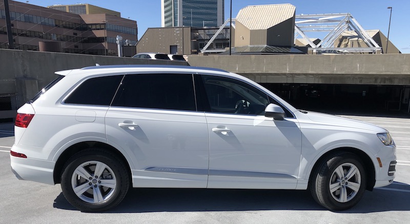 White Audi Q7 On Top Floor Of Parking Garage