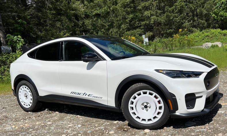 A Side View Of The White Ford Mustang Mach-E Rally Shows The Spoiler Isn'T As Prominent