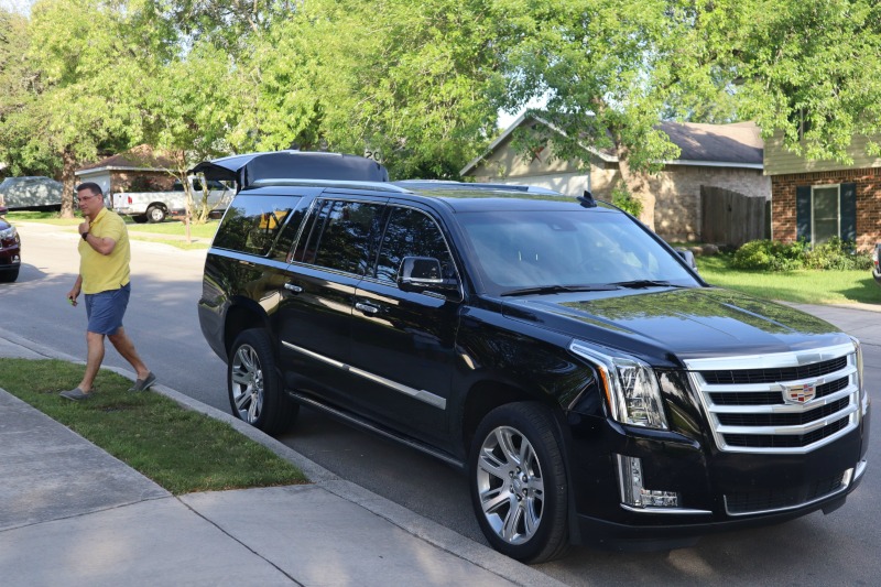 Black Cadillac Escalade With Hatch Up