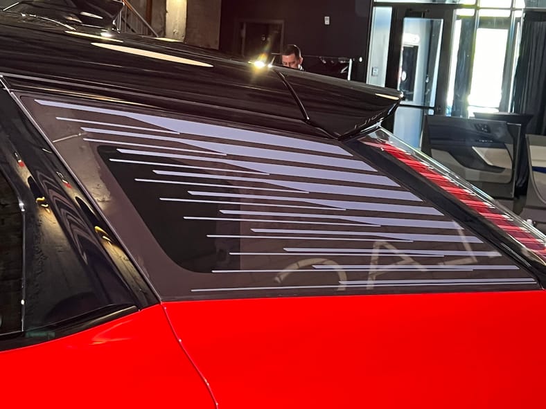 Etched Glass On The Rear Side Panels Leave A Distinct Impression In The 2025 Cadillac Optiq