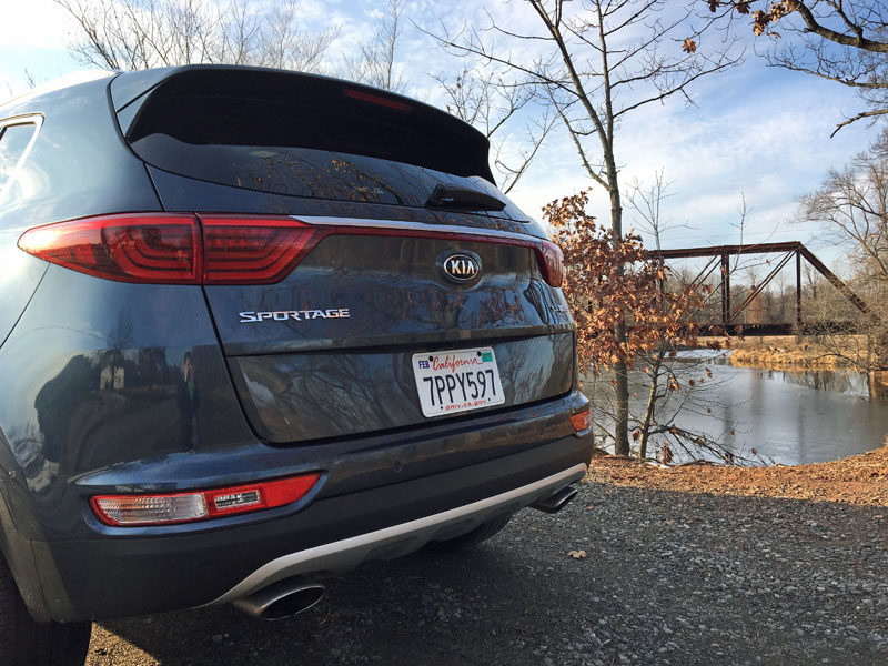 Black Exterior Of Kia Sportage Compact Crossover Rear Trunk