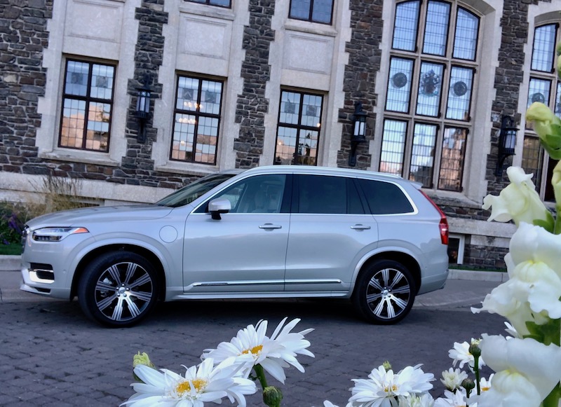 Silver Volvo Xc90 Parked On A City Street 