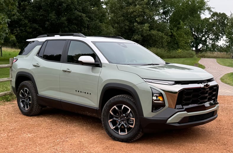 The 2025 Chevrolet Equinox Activ In Green Cacti With A White Roof