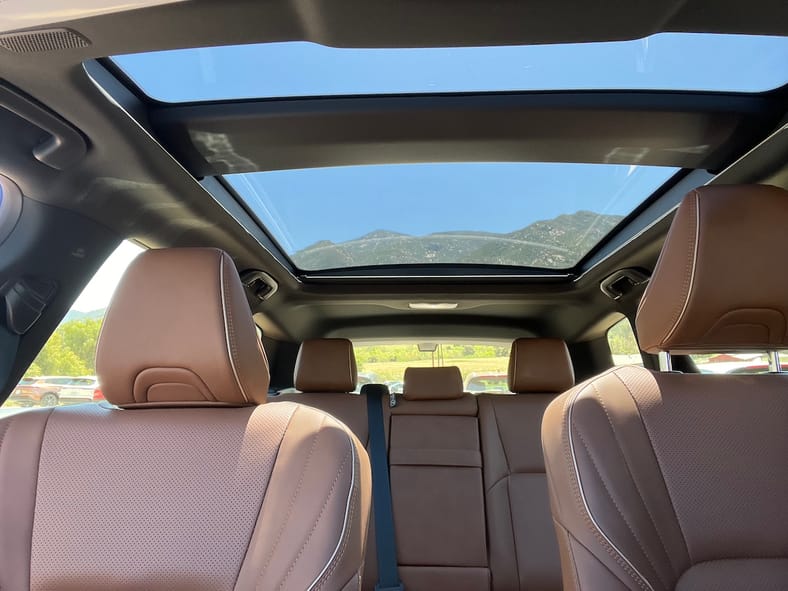 The Cabin Is Brightened By A Large Panoramic Sun Roof