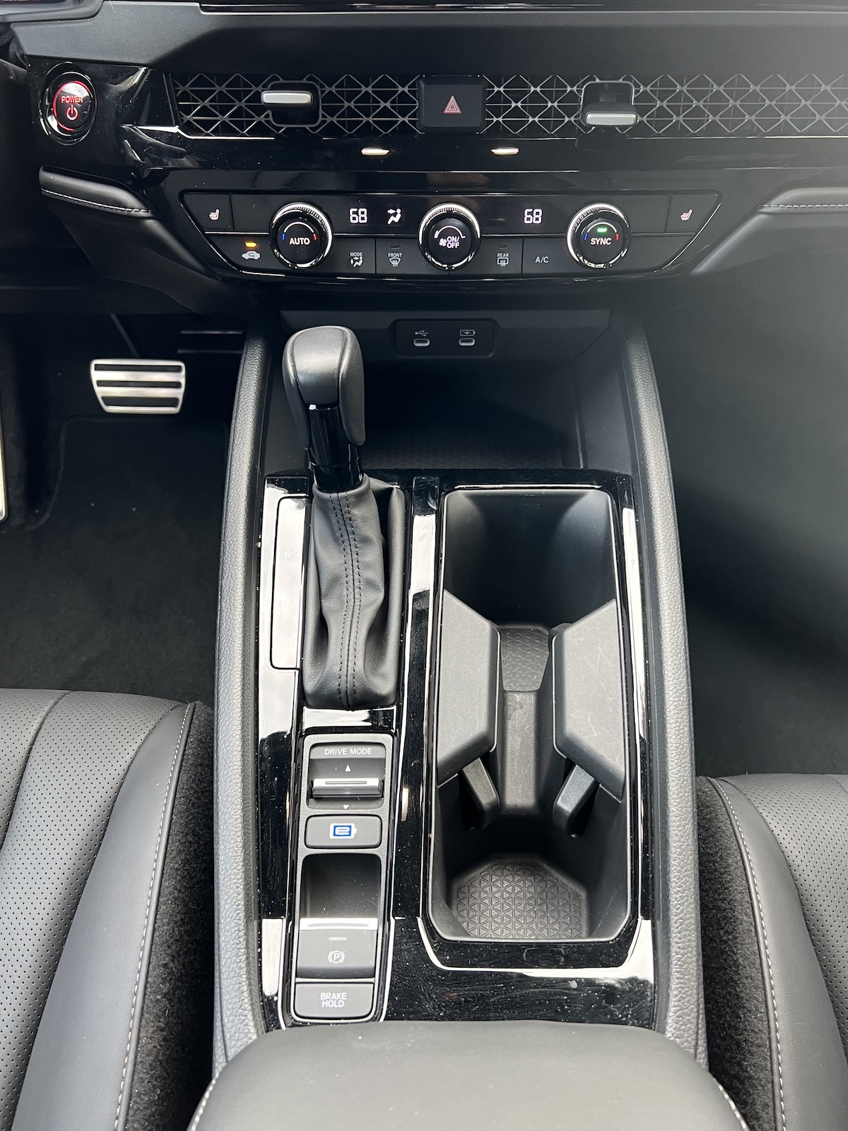 The Command Center With Gear Shift, Drive Mode Selector An Cup Holders