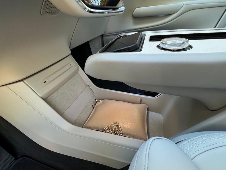 The Floating Center Console Opens Up Storage Underneath In The 2025 Volvo Ex90