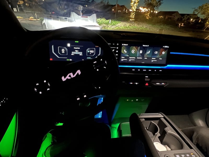 The Interior Of The Kia Ev9 With Ambient Lighting