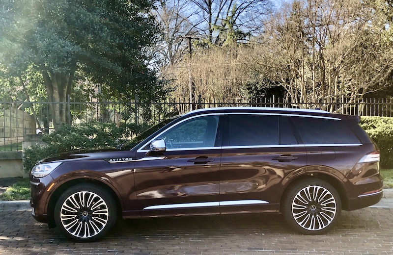 Lincoln Aviator In Front Of Green Trees 