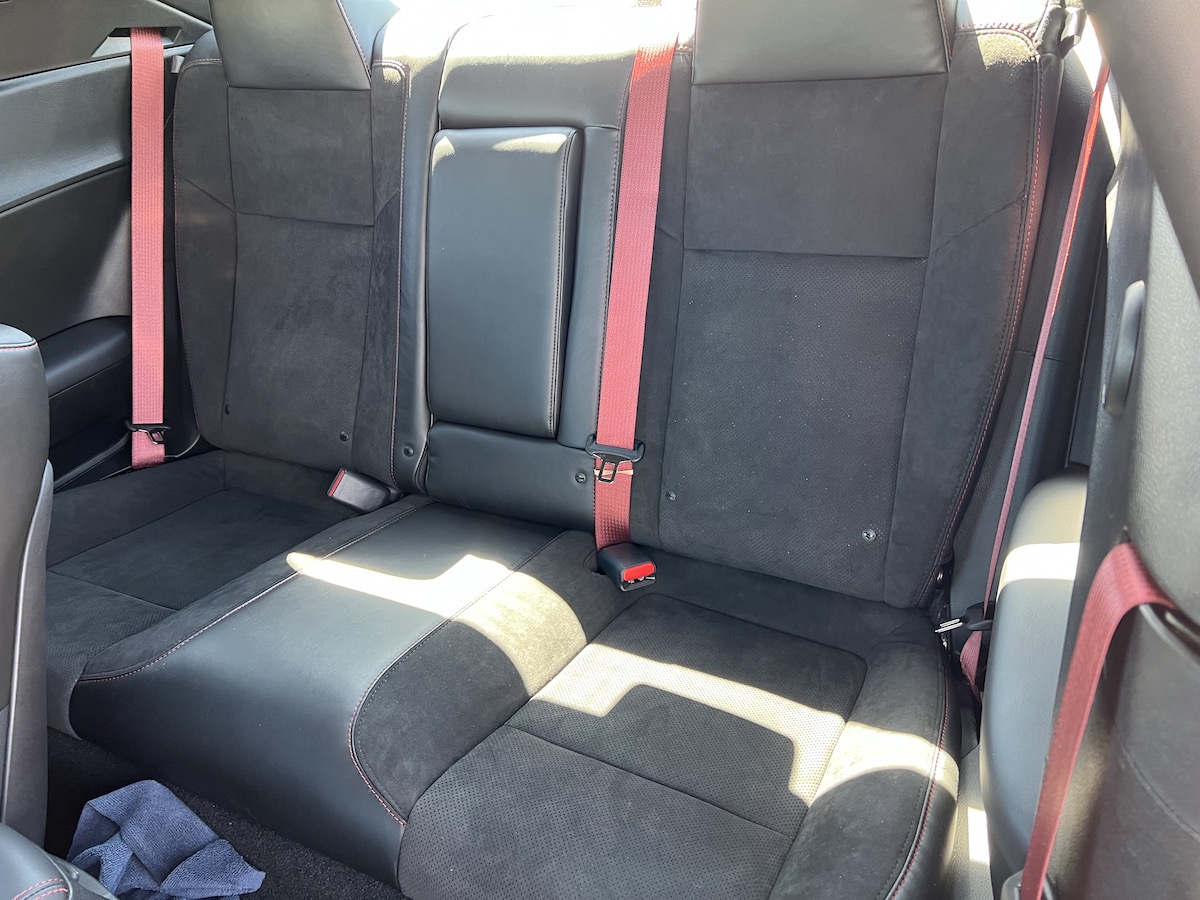 The Rear Seat In The Challenger Seats Two, But Tightly