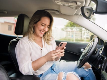 Woman Looking At Phone